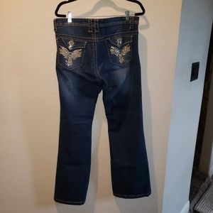 Boot cut jeans with blingy pockets